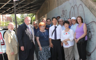 Community Partnership Cleans Vandalized LIRR Overpass