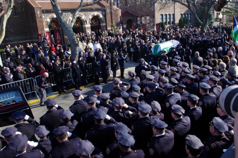 Thousands Mourn Fallen Officer
