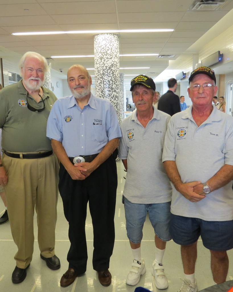 Vietnam Veterans of America National President John Rowan, left, Chapter 32 President Paul Narson, member Ray Ohrablo, and member Tom Bullaro informed veterans of the different services their organization provides, including funerals for individuals without family.