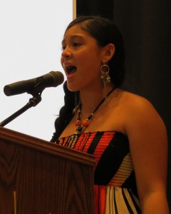 Desiree Wisotsky, of Glendale, sings the “Star-Spangled Banner” at the veterans’ forum. Wisotsky’s father is a veteran.