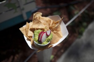 The chips and guacamole or plantains and guacamole are very popular dishes at Rockaway Taco, which also serves tacos, quesadillas, and fruit drinks.