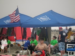 Wounded Warriors and other volunteers take a break from their water activities.