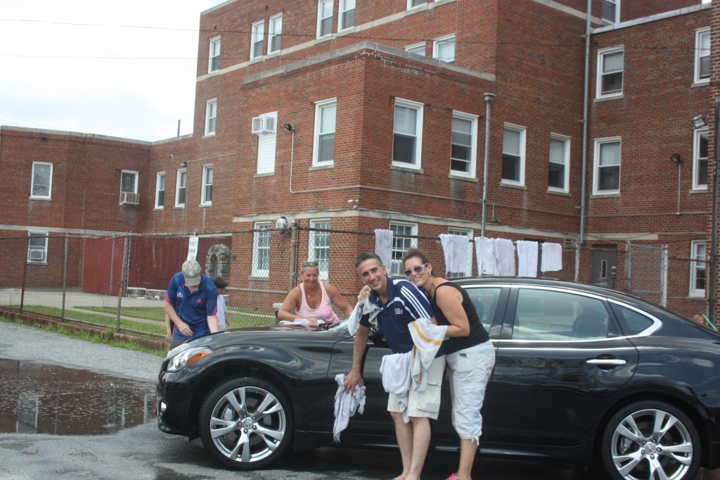 Athletic director Dr. Jerry Antonino and wife Jeanne agree on the ingredients of a good car wash: a smile, a towel, and most importantly, a lot of volunteers! Patricia Adams/The Forum Newsgroup 