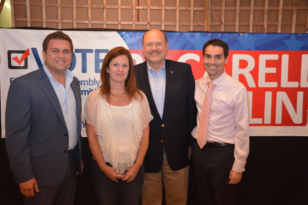 Republican state committee candidates Sal Bacarella, left, Anne Marie Devlin, Republican mayoral candidate Joe Lhota, and Councilman Eric Ulrich celebrate the opening of Bacarella’s and Devlin’s campaign headquarters last week. Photo Courtesy Kevin Ryan
