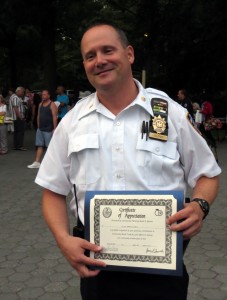 Deputy Inspector Henry Sautner, the commanding officer of the 102nd Precinct, received a certificate of appreciation for the hard work he, and his officers, have done in the area.