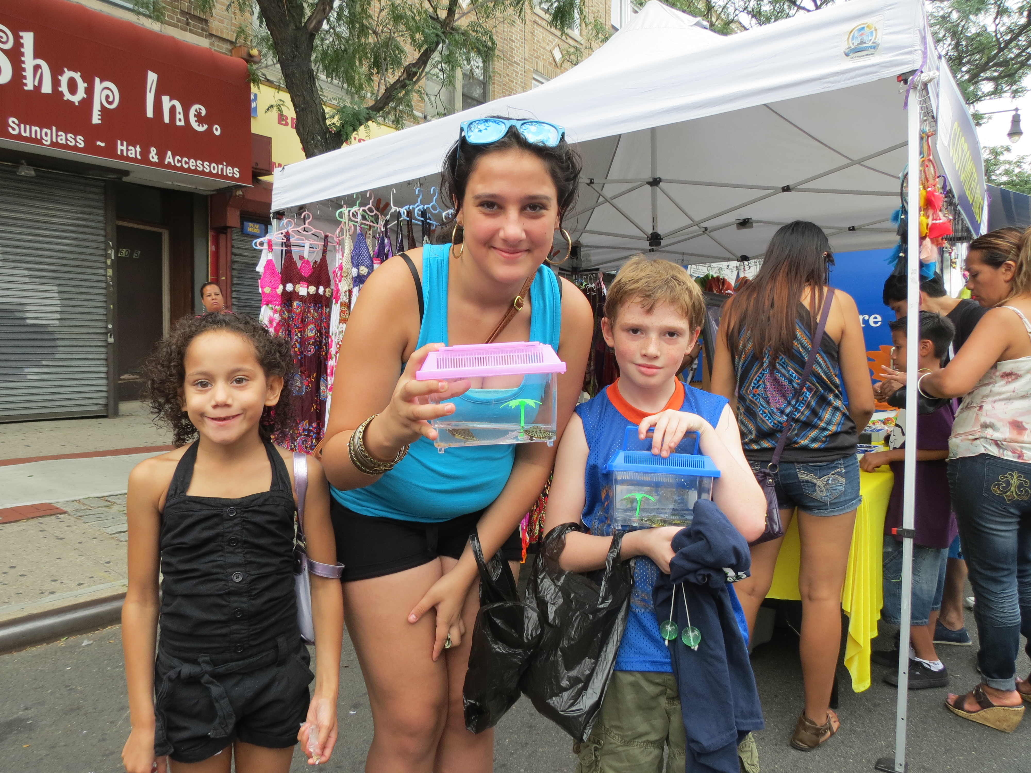 Ridgewood residents Anaya, 8; Joanna, 13; and Nicholas; 8, Ruiz won turtles at the fair.