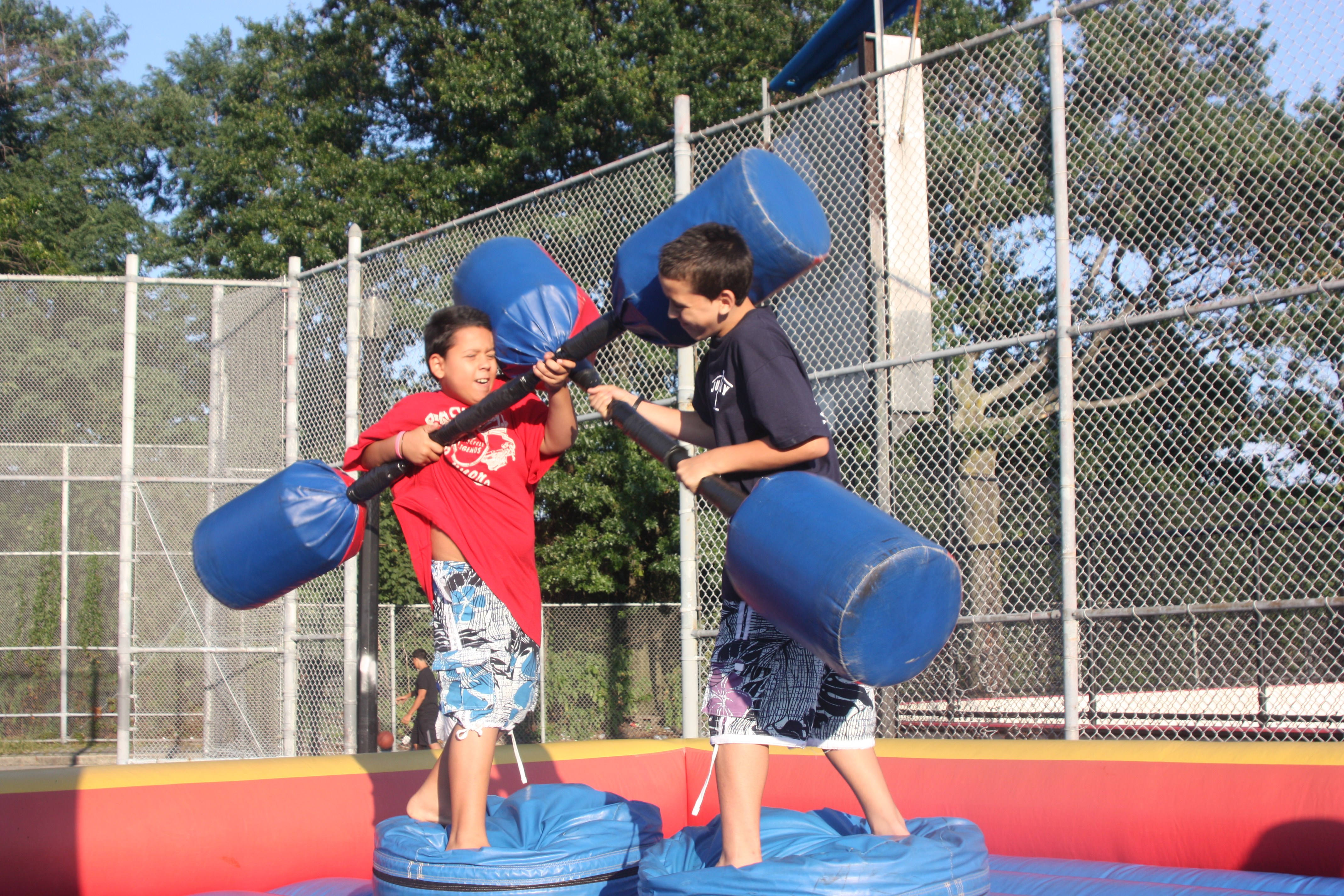 In the jousting pit, battling brothers, Bryton and Jasper Gomez, 9 and 12, fought it out as onlookers rooted them on.