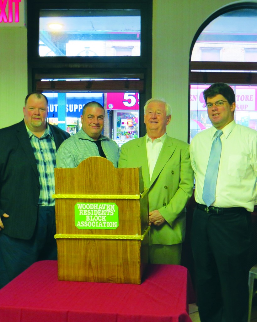WRBA President Ed Wendell, left, announced Wayne Ruggiere, of Ohlert-Ruggiere; American Legion Post 118 Commander John Lawless; and Walker Funeral Home owner Paul Rudolph will be honored at the organization's annual fundraiser. St. Thomas the Apostle teacher Patricia Eggers, who is not pictured, will also be honored at the event. Anna Gustafson/The Forum Newsgroup