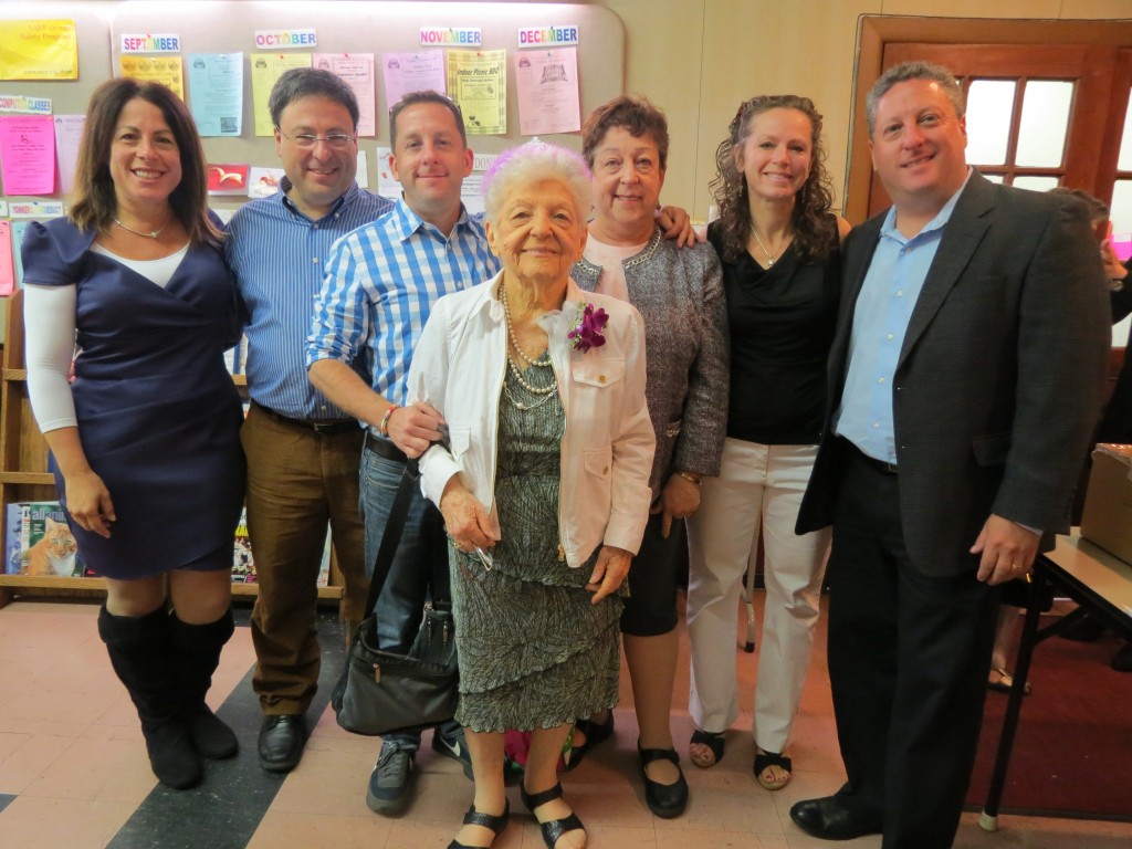 Florence Selkin, center, is joined by her family to celebrate her 100th birthday at the Middle Village Adult Center on Tuesday. Anna Gustafson/The Forum Newsgroup 