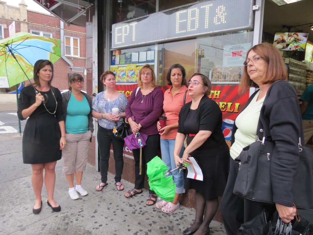 Councilwoman Elizabeth Crowley, left, parent and civic leaders, and Queens Department of Transportation Commissioner Dalila Hall, second from right, met to discuss concerns about pedestrian safety at the Maspeth intersection where five students were hit by a car last week. Anna Gustafson/The Forum Newsgroup