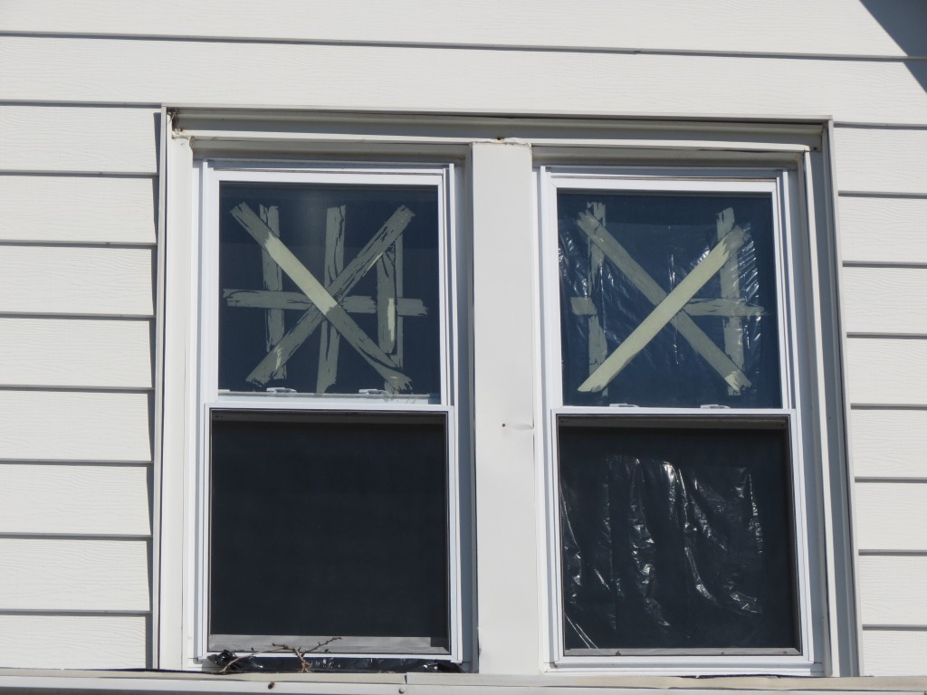 The house has several broken windows, and last week graffiti was painted on the home's fence.