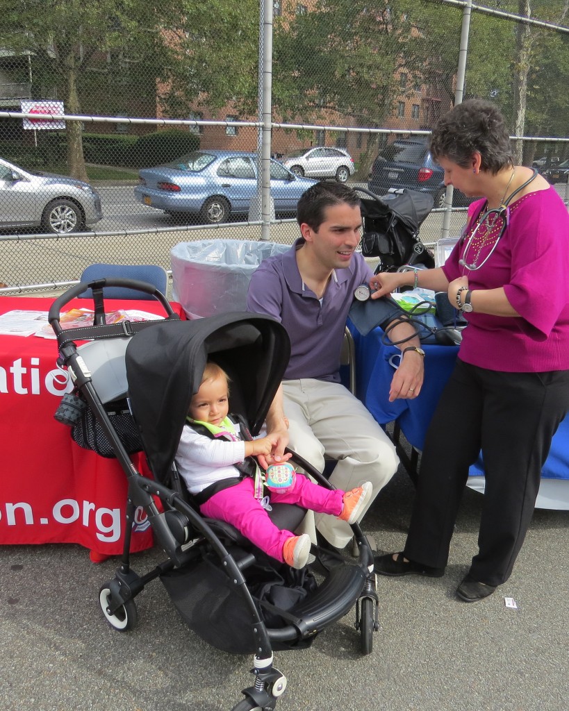 Just to prove parenthood agrees with politics, Councilman Eric Ulrich brought daughter Lily along to have a free blood pressure screening, provided by Medysis. His fans will be happy to know the councilman has textbook blood pressure—110/70.
