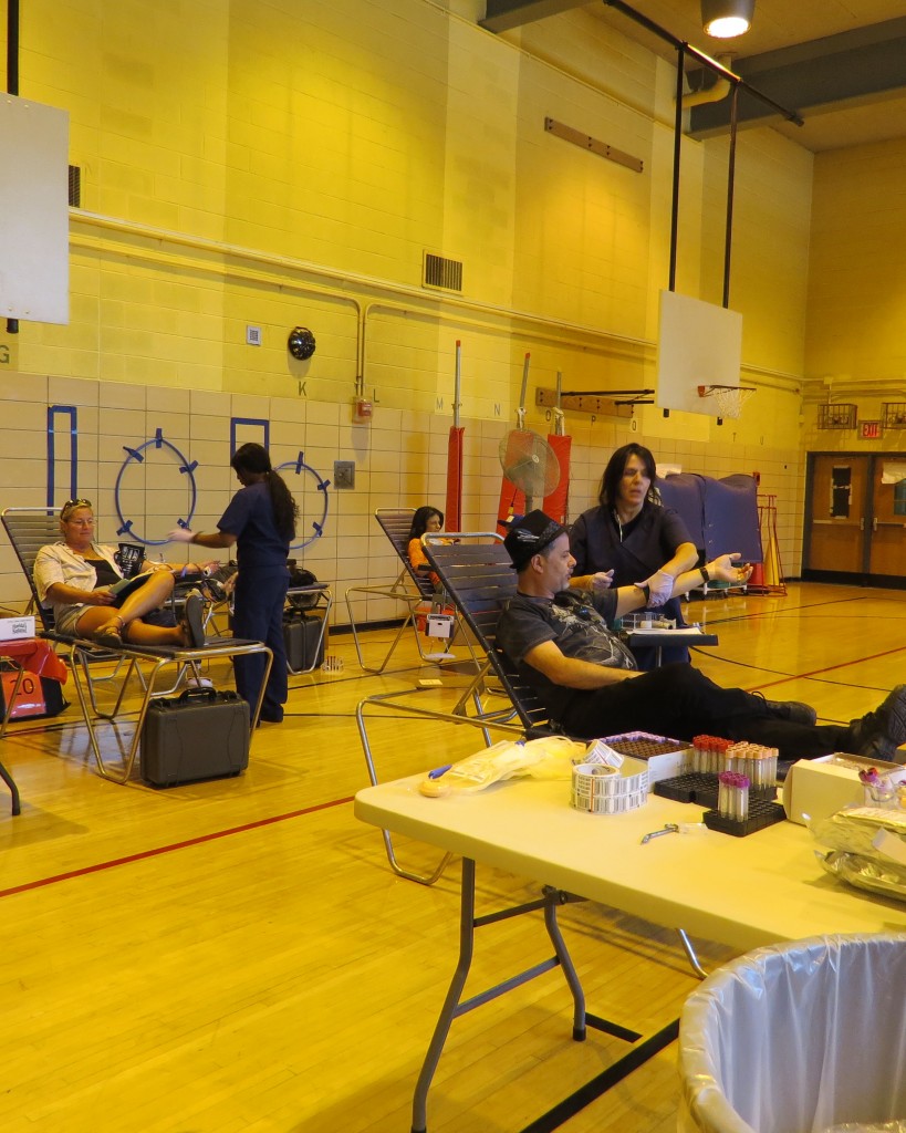 The blood drive was set up in the gym of the school and saw a constant stream of donors throughout the event.