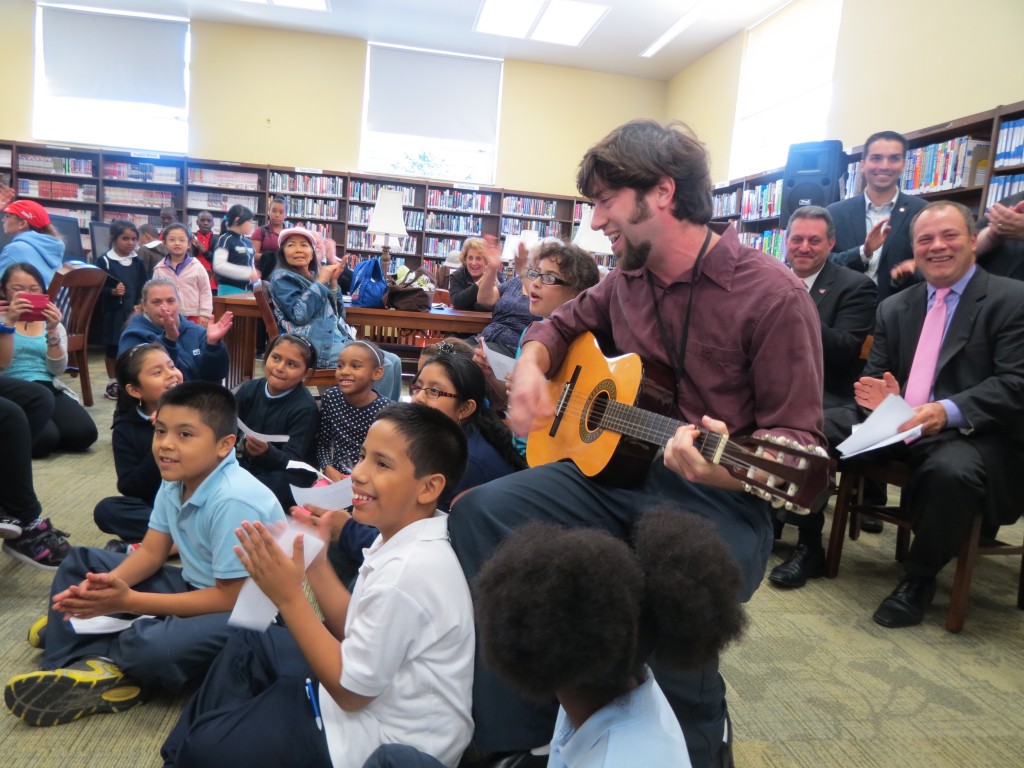 Woodhaven students sing at the library's reopening celebration. Anna Gustafson/The Forum Newsgroup