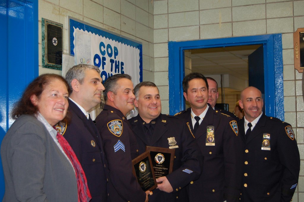 Pictured from left to right: Heidi Harrison Chain, President of the 112th Precinct Community Council, Captain Conforti, Sgt. Frank Crocitto, Police Officer Christopher Lipton, Chief Chan, Captain Desmond, and Lt. Goldberg. Photo Courtesy 112th Precinct