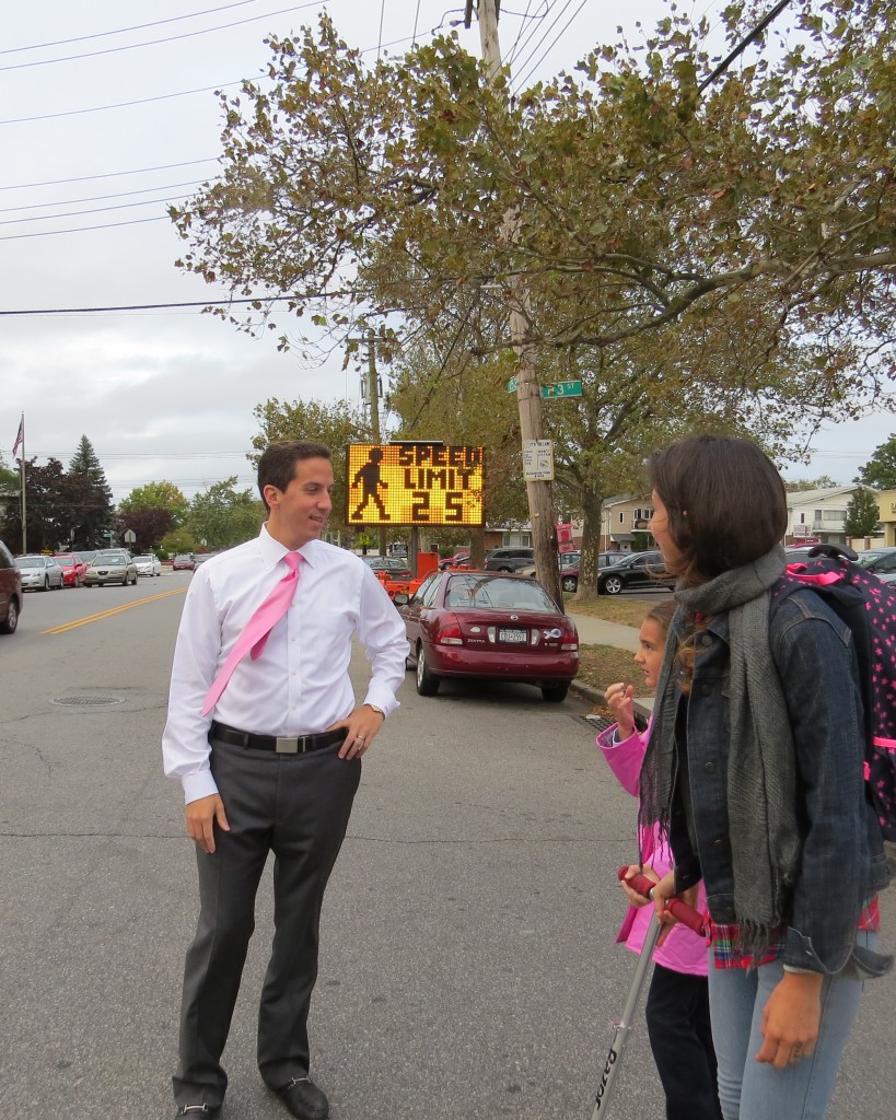 Assemblyman Phil Goldfeder is all smiles as he greets parents and students whom he hopes will now be safer when they cross the street after the installation of a mobile speed board by the DOT. Goldfeder is now pushing for more permanent traffic control at the school such as speed bumps and additional signage. Patricia Adams/The Forum Newsgroup