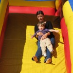 Children and adults alike had fun on a variety of rides, including inflatable slides.