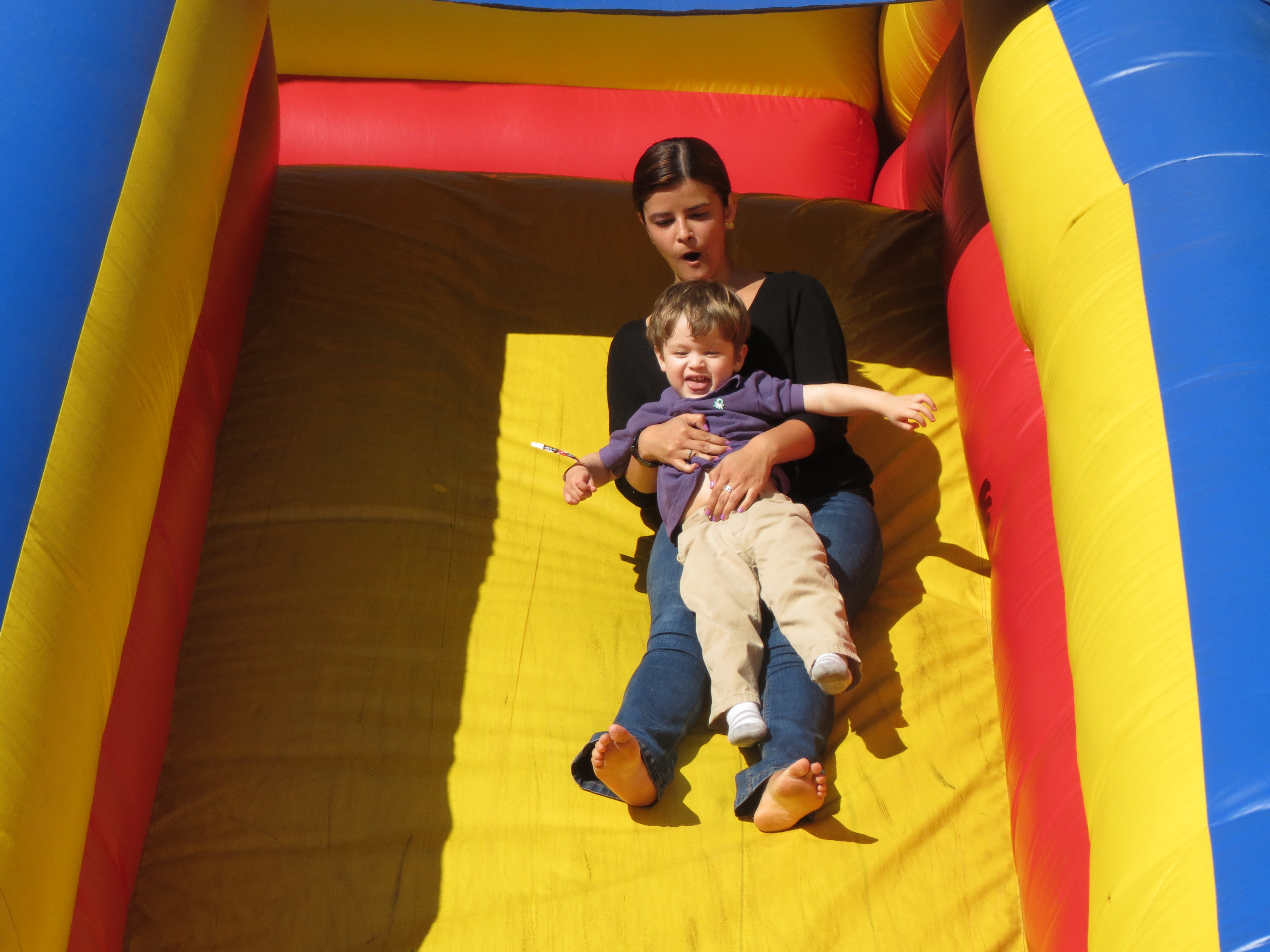 Children and adults alike had fun on a variety of rides, including inflatable slides.