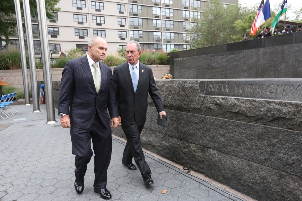 Police Commissioner Raymond Kelly, left, and Mayor Bloomberg attend a ceremony memorializing six members of the NYPD, including one who served in Queens, who died in the line of duty. 