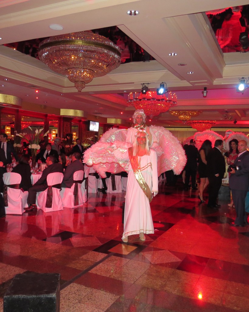 Hundreds of guests were greeted by Angels in flowing white costumes and feathered wings.