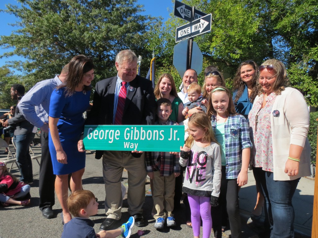 Family and friends of George Gibbons Jr. joined Councilwoman Elizabeth Crowley for a ceremony Saturday to co-name 60th Drive in honor of the Maspeth community leader. Anna Gustafson/The Forum Newsgroup