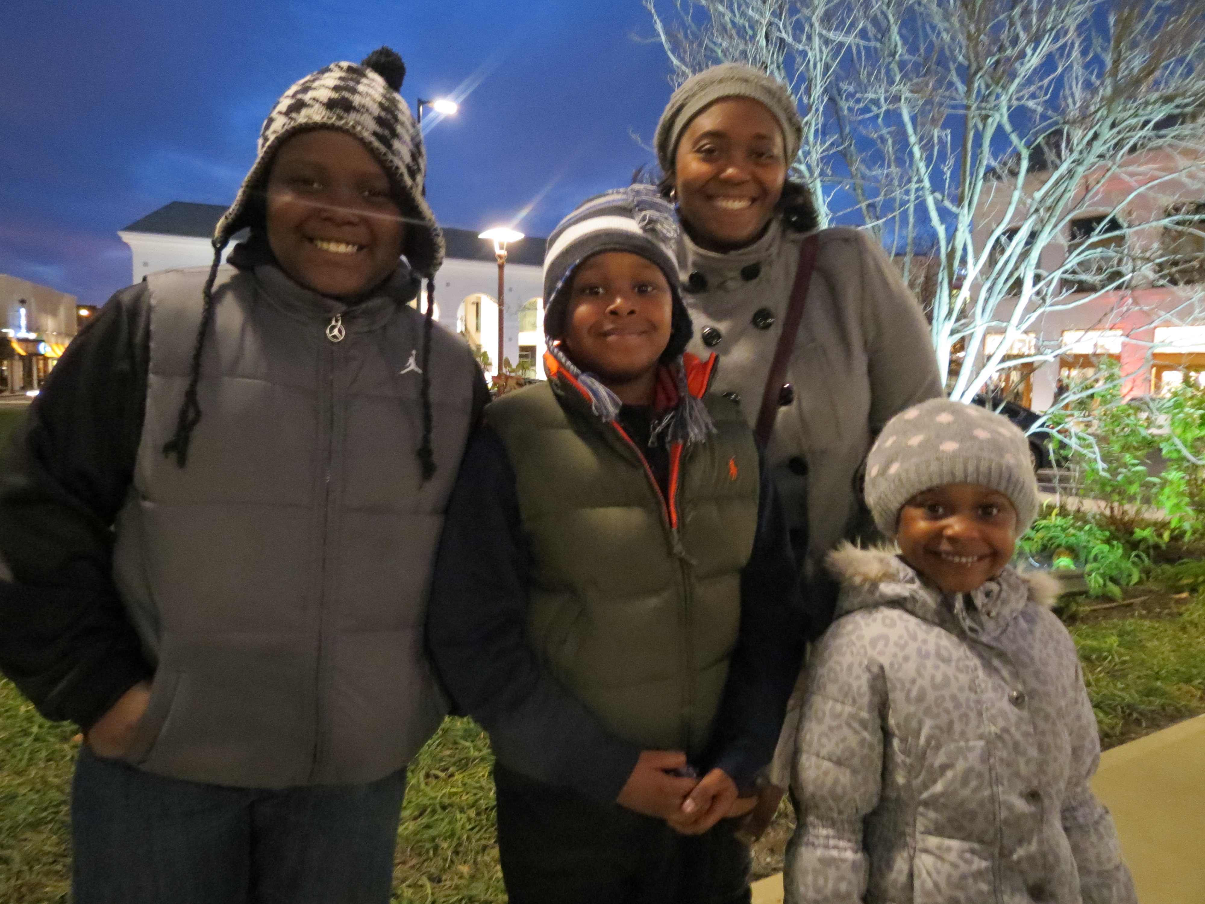 Jordan, 10, left; Keith, 8; Sydney, 4; and Brandi Gibbons, of Fresh Meadows, said they were thrilled to spend some time with Santa Saturday night.