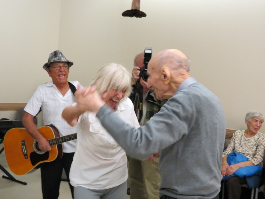 Max Stern can frequently be seen spinning women around the dance floor at the senior center. Here, he and center member Bunny Gelfand entertain the crowd.