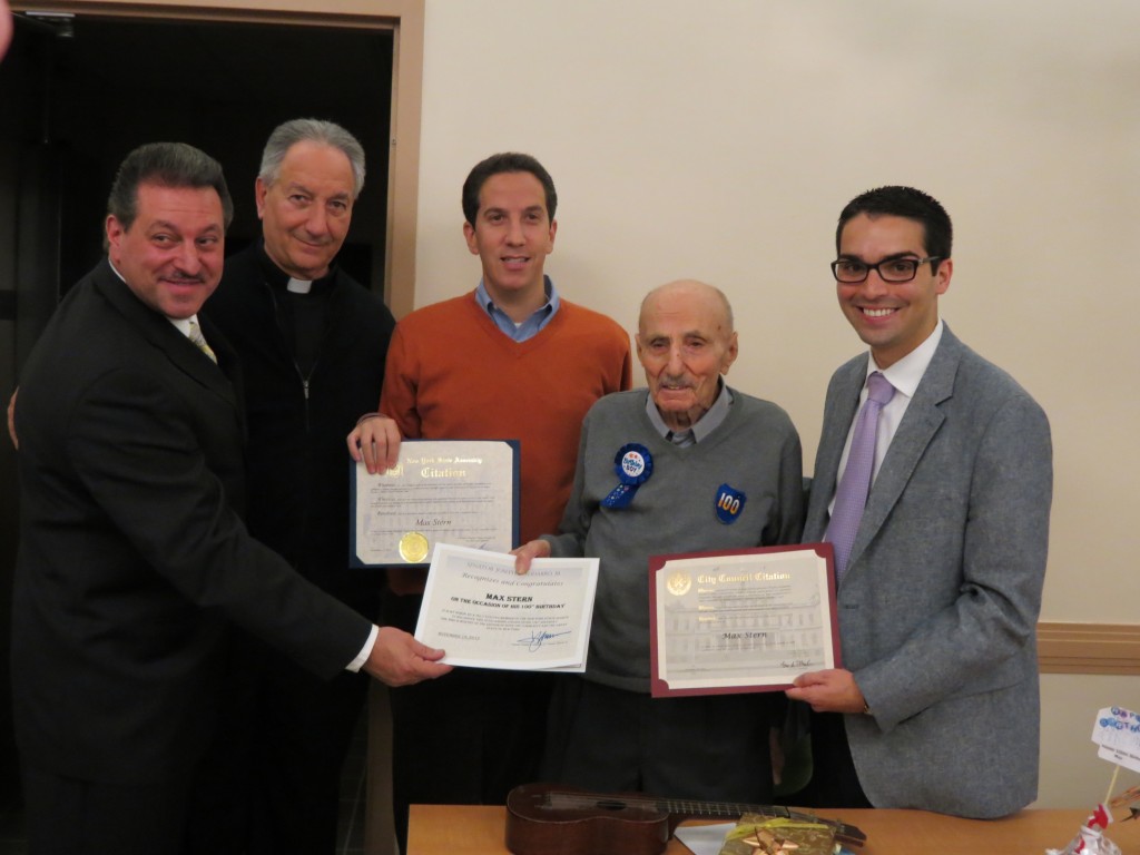 State Sen. Joe Addabbo Jr., left, Monsignor Alfred LoPinto of St. Helen's Church, Assemblyman Phil Goldfeder, Max Stern, and Councilman Eric Ulrich commemorate  the 100-year-old's birthdays. The legislators gave Stern proclamations marking his 100 years.