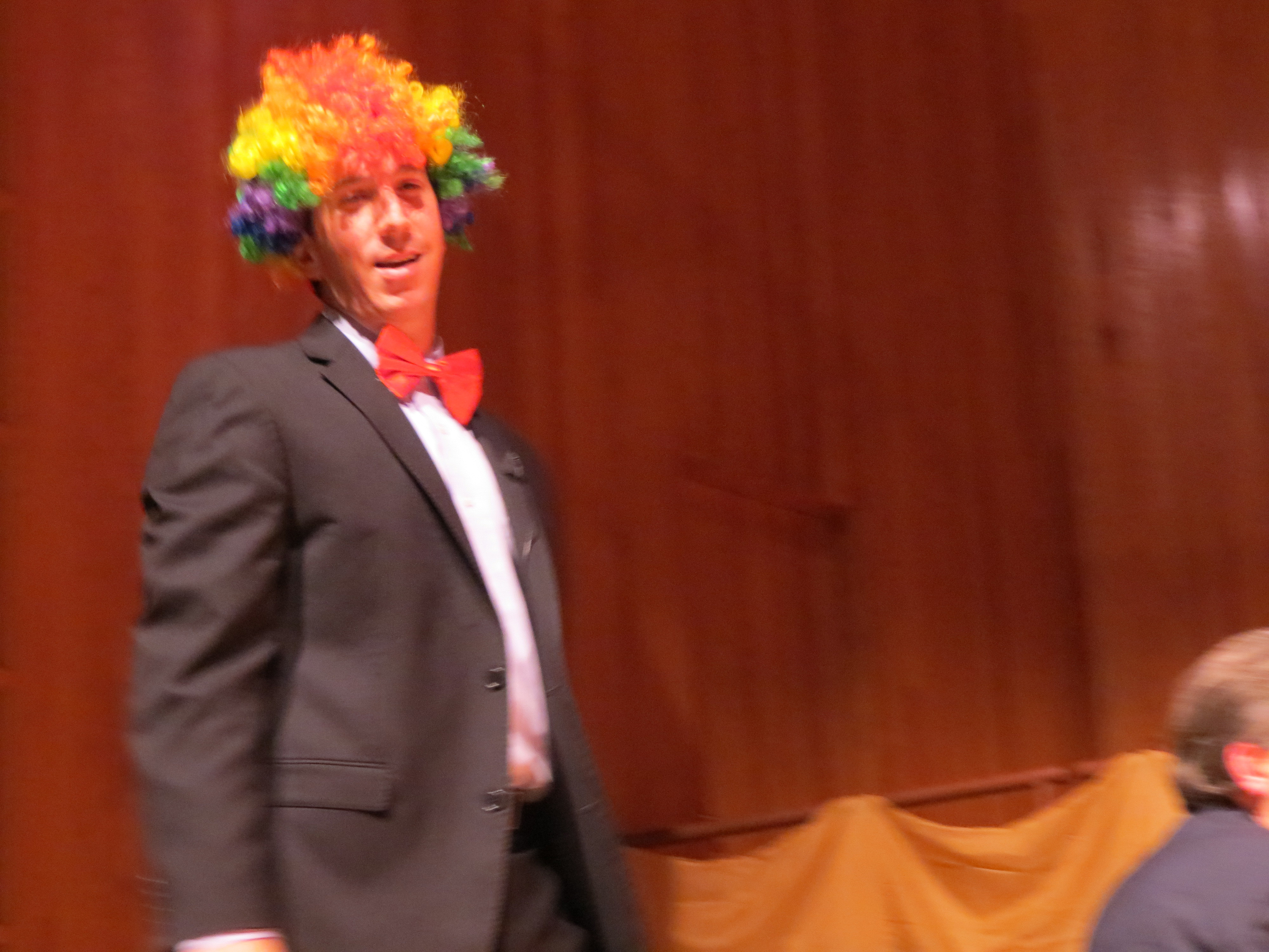 Assemblyman Phil Golder dons a rainbow Afro wig in honor of Mayor-elect Bill de Blasio's son's hairstyle that assumed a starring role in de Blasio's mayoral bid.