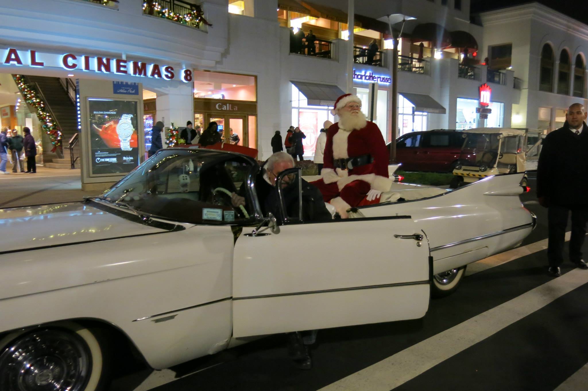 Santa arrived less traditionally, and more stylishly, in a white Cadillac this year. Photo Courtesy Atlas Park Shops