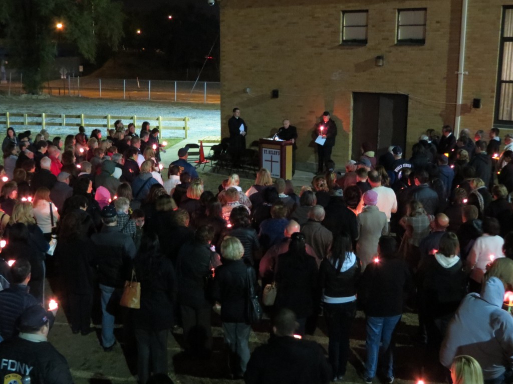 Close to a couple hundred people attended the vigil at St. Helen's. Anna Gustafson/The Forum Newsgroup