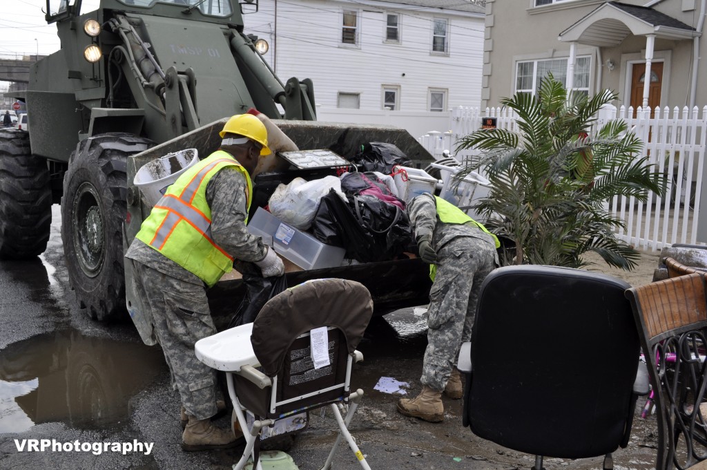 National Guard troops were on the scene helping not only to ensure order and minimize looting but also to help in the massive clean-up of personal possessions turned into debris. Photo Courtesy Victoria Holt/VRPhotography