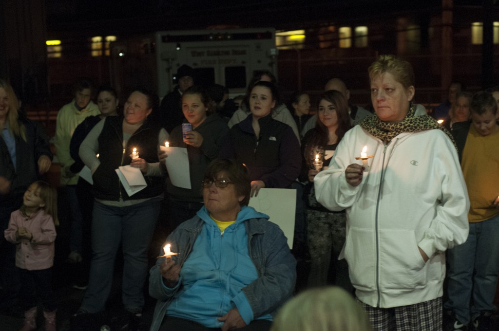 About 100 people gathered for a candlelit vigil at the West Hamilton Beach Volunteer Fire Department Monday night. Kate Bubacz/The Forum Newsgroup