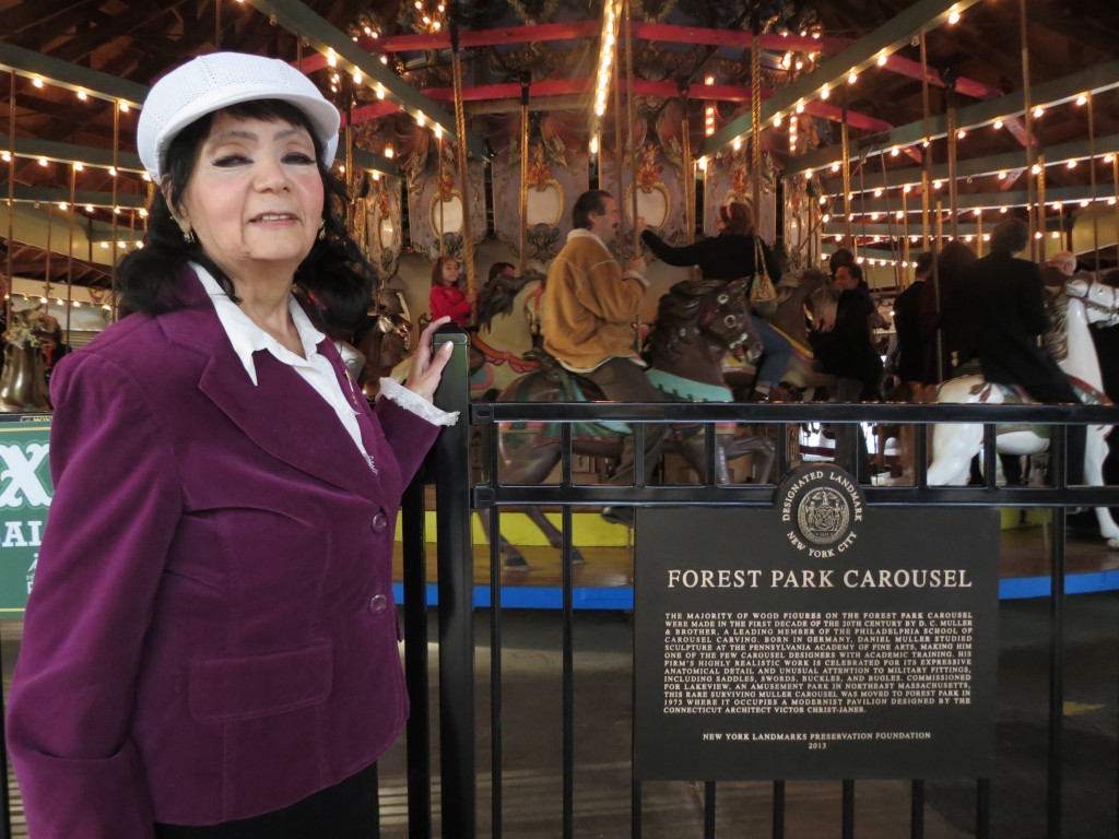 Greater Woodhaven Development Corporation Executive Director Maria Thomson stands by the carousel that she fought for more than two decades to preserve.