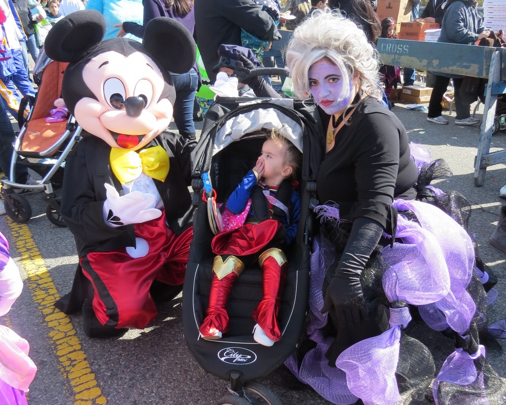 It appears that Super Girl was trying to have a word with Mickey while the camera distracts Ursula, the Sea Witch.