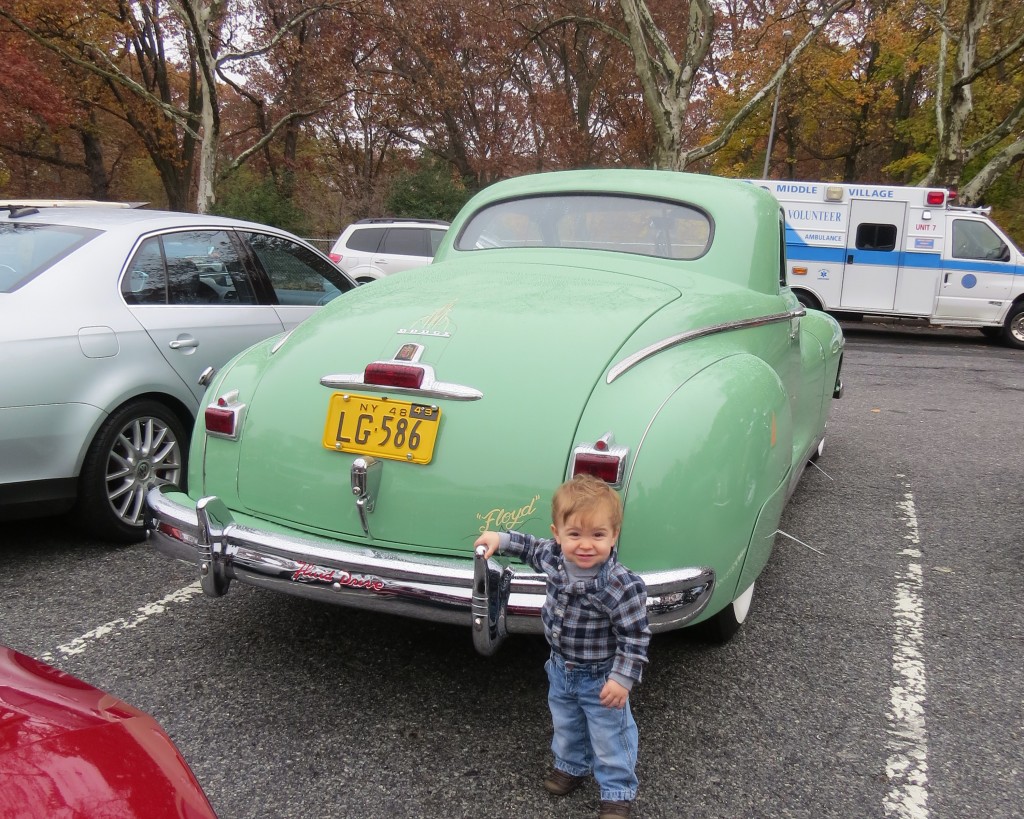 Jack O’Dell shows off his grandfather's vintage Ford and looks forward to being behind the wheel one day. Patricia Adams/The Forum Newsgroup 