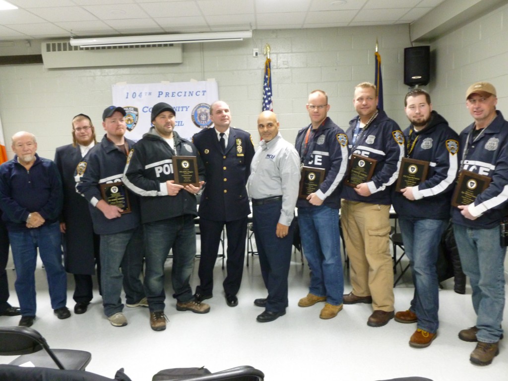 The 104th Precinct issued high praise at this week's community council meeting for police officers who helped to bring down a pot farm in Ridgewood. Phil Corso/The Forum Newsgroup 