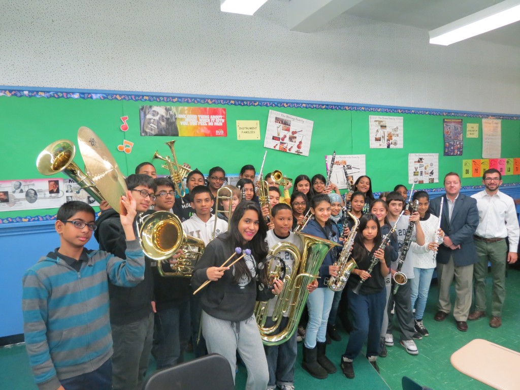 Music students at JHS 202 show off their new instruments, which the Ozone Park school landed thanks to a $30,000 grant from the Mr. Holland's Opus Foundation. Anna Gustafson/The Forum Newsgroup  