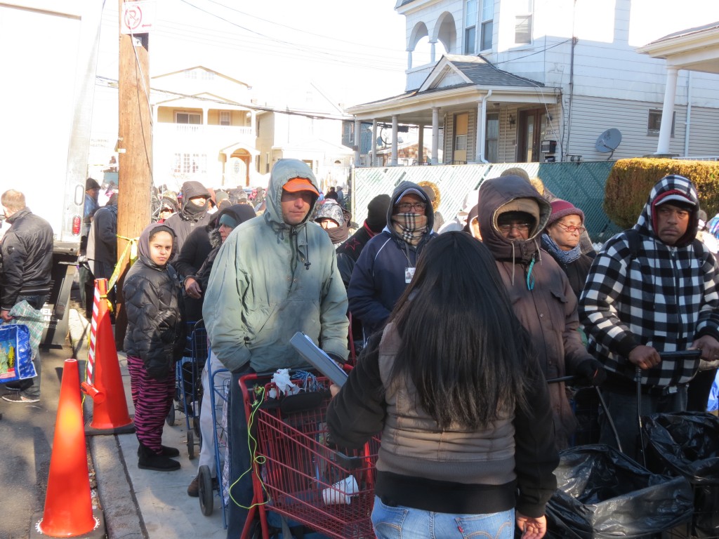 South Queens residents lining up at the River Fund food pantry in Richmond Hill last week said federal cuts to food stamps left them struggling even more than usual. Anna Gustafson/The Forum Newsgroup 