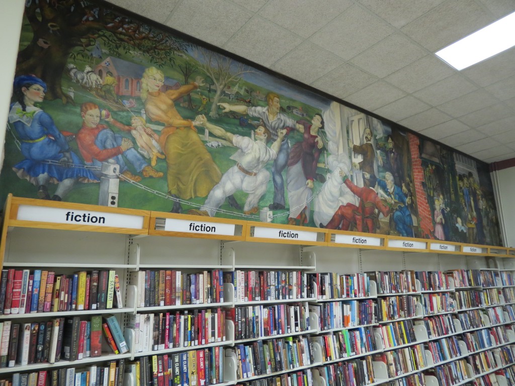 The mural that is prominently painted in the Richmond Hill Library's reading room was a Works Progress Administration project done by the artist Philip Evergood. The painting, which was likely finished in the fall of 1936, celebrates the founding of Richmond Hill by the lawyer Albon Plattman, who wanted to create a garden community away from the dirt and chaos of Manhattan.