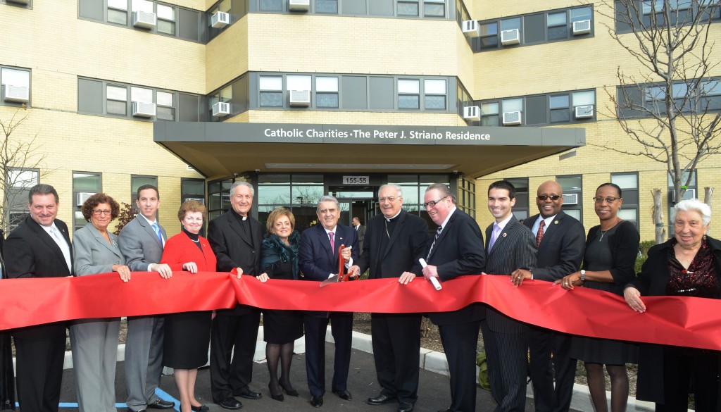 Elected officials and Catholic Charities representatives gathered for the ribbon cutting on the new affordable housing for seniors on Cross Bay Boulevard last week. Photo Courtesy Catholic Charities 
