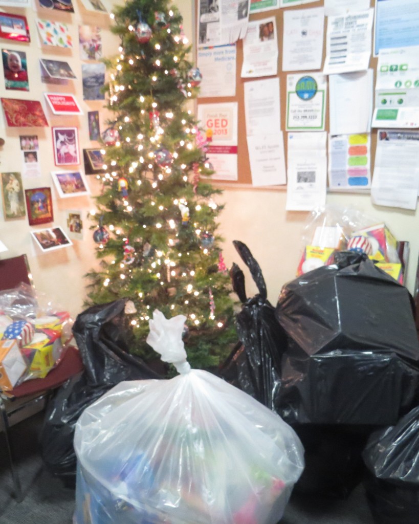 Staffers say it was a lot of fun trying to get to their desks amidst mountains of bags filled with toys at Councilman Ulrich’s office. Patricia Adams/The Forum Newsgroup 