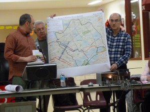 Community Board 5 members, at their meeting last week, show where new bike lanes will be implemented in Ridgewood and Glendale.  Photo by Phil Corso