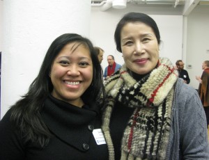  Jackie DeDios, left, development manager of the Queens Council on the Arts, and dance artist Song Hee Lee spend time at the QCA’s open house last week. Photo courtesy Queens Council on the Arts