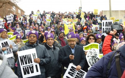 Queens pols, airport workers mark MLK Day in cuffs