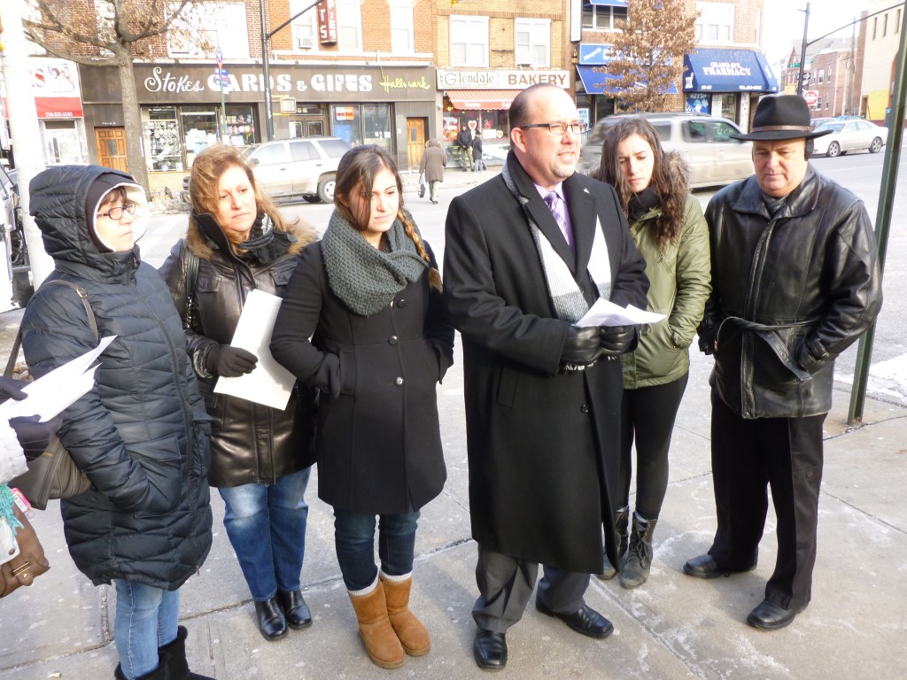 Civic leader Dmytro Fedkowskyj, center, and other community advocates gathered in Maspeth Tuesday to urge the city to implement policies that will prevent the pedestrian deaths that have plagued Queens - and the rest of the city. Photo by Phil Corso