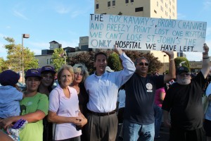 Assemblyman Phil Goldfeder, center, and area residents at a rally last year, when individuals called for additional funding for St. John's Episcopal Hospital in Rockaway. Photo courtesy NYS Assembly