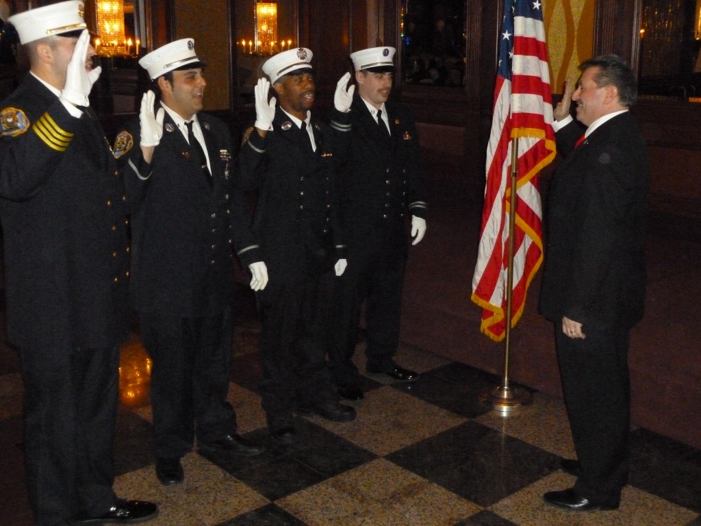 State Sen. Joe Addabbo Jr. swears in members of the West Hamilton Beach Volunteer Fire Department at the group's 86th annual dinner, dance and installation at Russo's on the Bay last week. Photo by Phil Corso