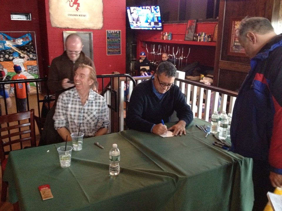 Mets great Ron Darling, seated at right, signs autographs for fans at the first ever Queens Baseball Convention. Photo by Brian Mangan