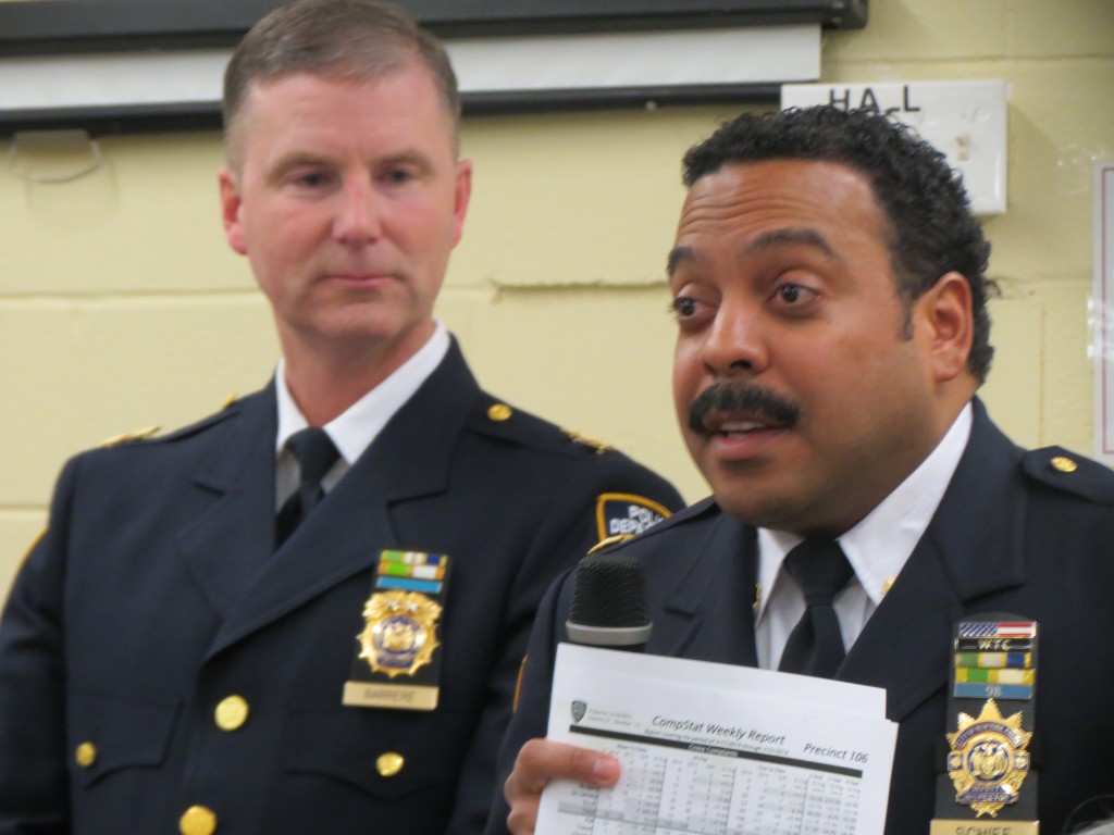 Deputy Chief David Barrere, the new commanding officer of Patrol Borough Queens South, left, and Deputy Inspector Jeffrey Schiff, commanding officer of the 106th Precinct, address concerns about crime at the inaugural Howard Beach Lindenwood Civic Tuesday night. Photo by Anna Gustafson